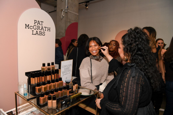 woman having her makeup done at the allure best of beauty 2024 live event